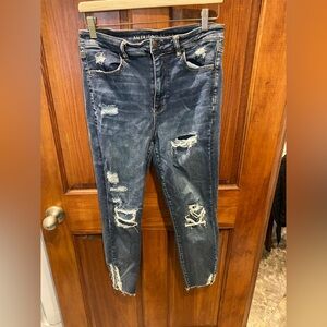 Distressed Blue Denim Jeans